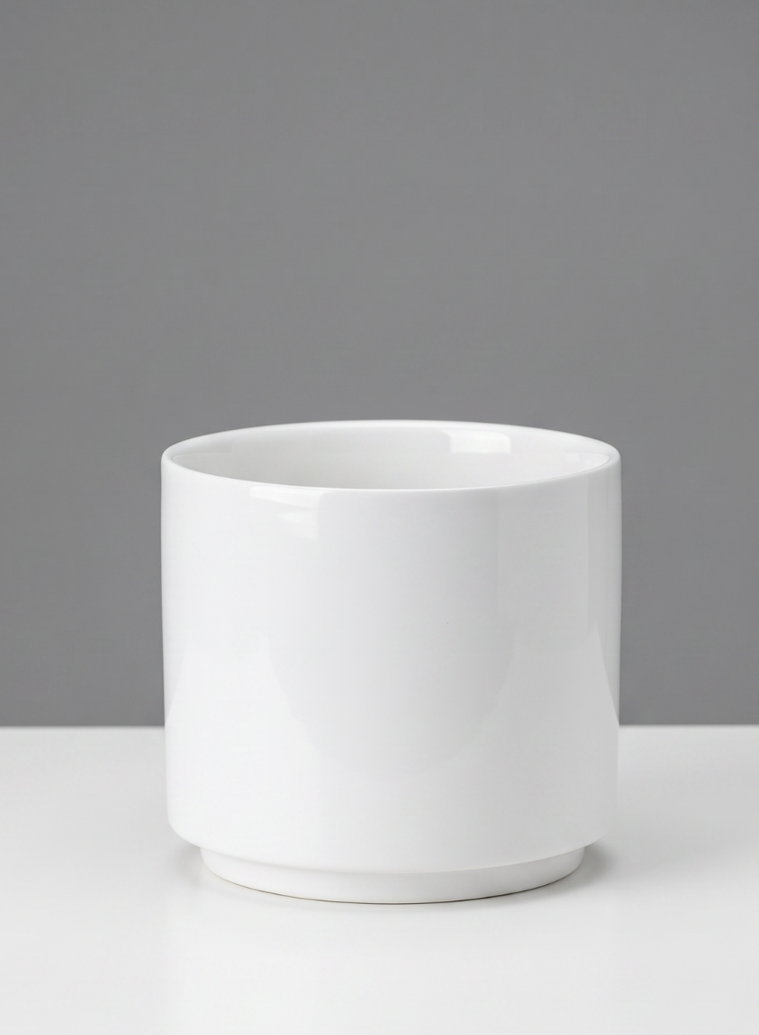 A set of four 4-inch-tall Florist Choice gloss white ceramic cylinders is displayed on a white surface against a gray background.