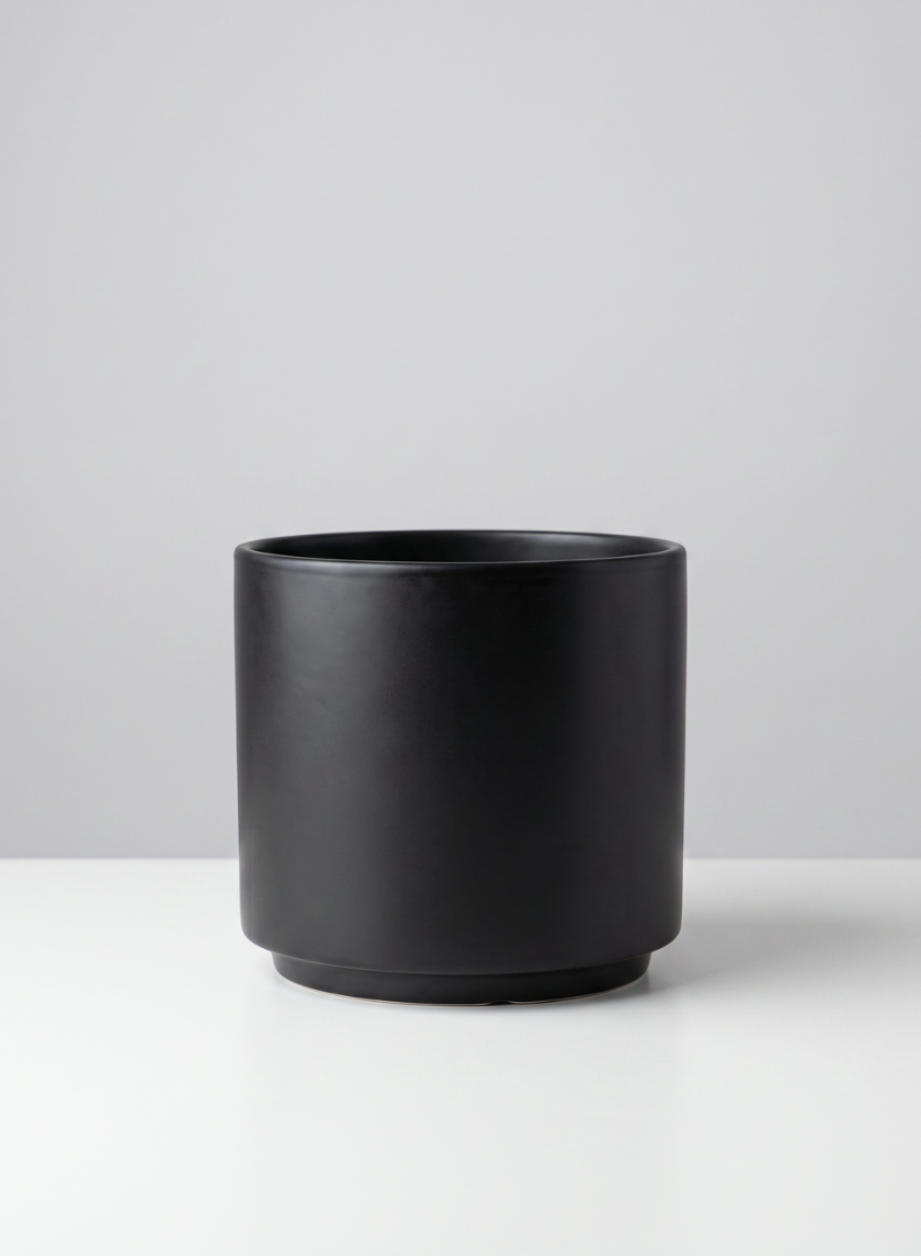 A set of two 5.25-inch tall Florist Choice matte black cylinder planters rests on a white surface against a light gray background.