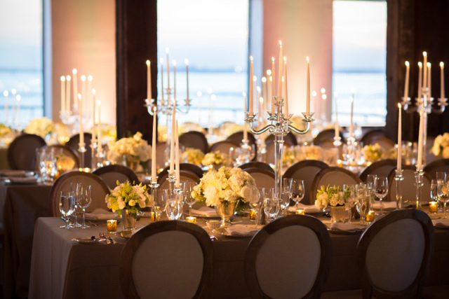 Tables set with tall crystal candelbras.
