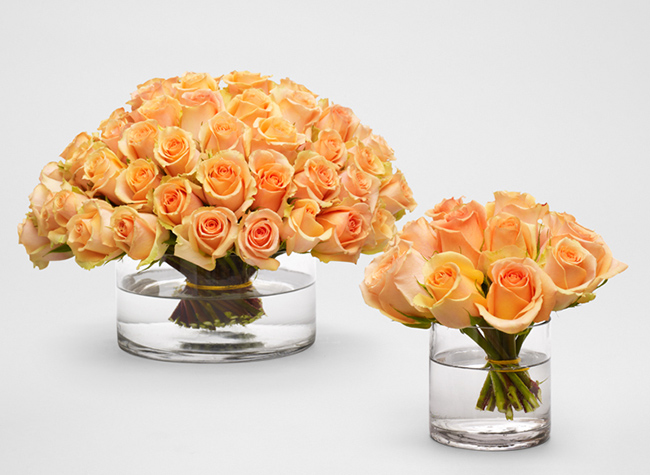 Two beautiful arrangements of Versailles Roses.