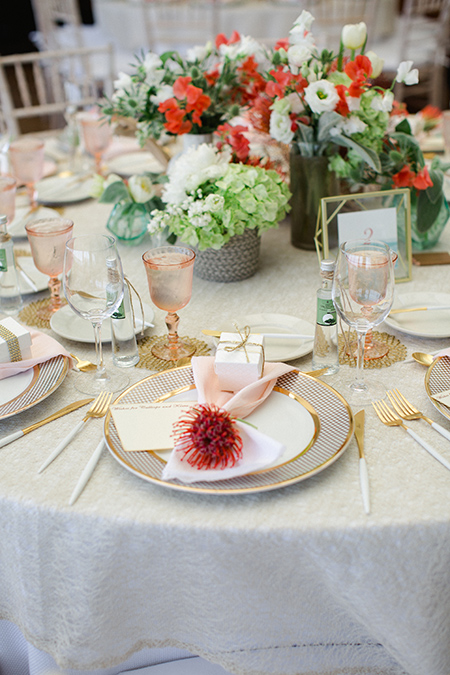 Details: A pin cushion protea at each place setting.