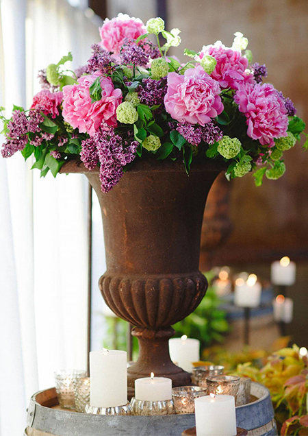 10. Peonies, lilac, & viburnum in a large urn.