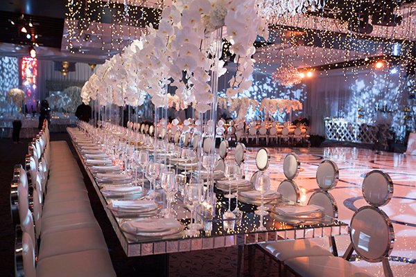 wedding-reception-orchids-hanging-lights_blog