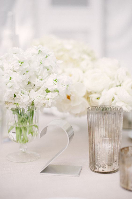 White wedding tablescape. (via Style Me Pretty)