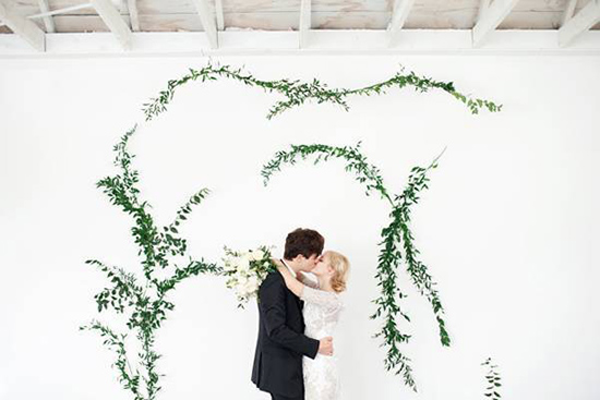 modern wedding ceremony vine backdrop