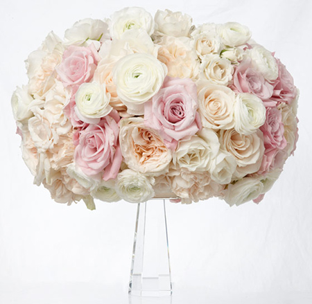 pink and white rose and ranunculus centerpiece