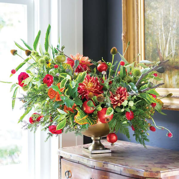 waterlily dahlia holiday arrangement with fruit in a gold bowl