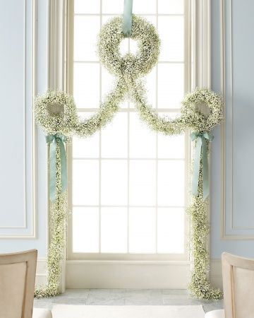 baby's breath garland and wreath for a wedding ceremony