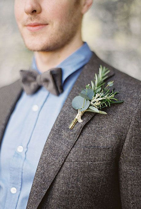 rosemary and eucalyptus boutonniere for groom