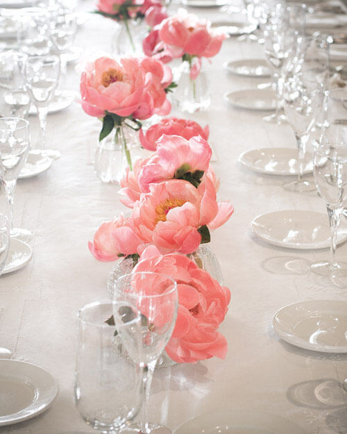 low wedding centerpiece of pink peonies in small vases martha stewart weddings
