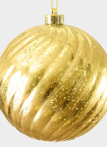 A 6-inch plastic "Real Mercury Glass Look" gold swirl ornament featuring a spiral pattern and speckled glitter design hangs by a small gold loop.