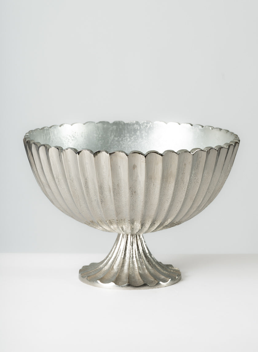 A 12in wide Palermo brushed silver scallop compote metal bowl with a ribbed texture, displayed against a plain white background.