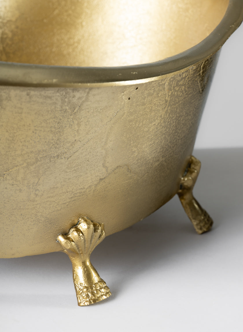 Close-up of the 11.5in Wide Atelier Decorative Metal Mini Royal Bathtub, featuring a textured gold finish and ornate claw-shaped feet, displayed against a plain light background.
