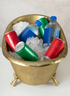 An 11.5in Wide Atelier Decorative Metal Mini Royal Bathtub holds ice, red and green soda cans, and blue-labeled plastic water bottles.