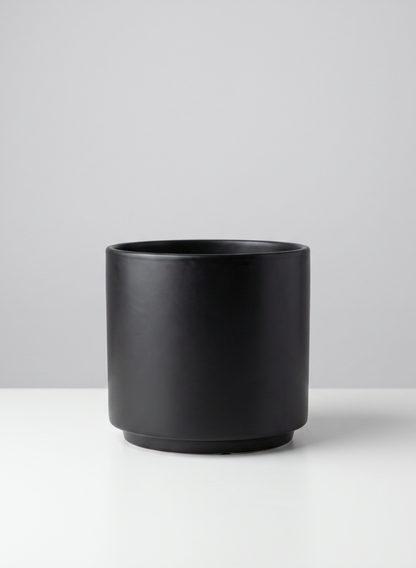 A set of two 5.25-inch tall Florist Choice matte black cylinder planters rests on a white surface against a light gray background.