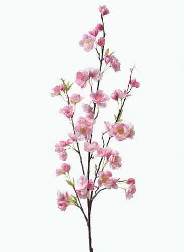 Artificial cherry blossom branch with pink flowers on a white background