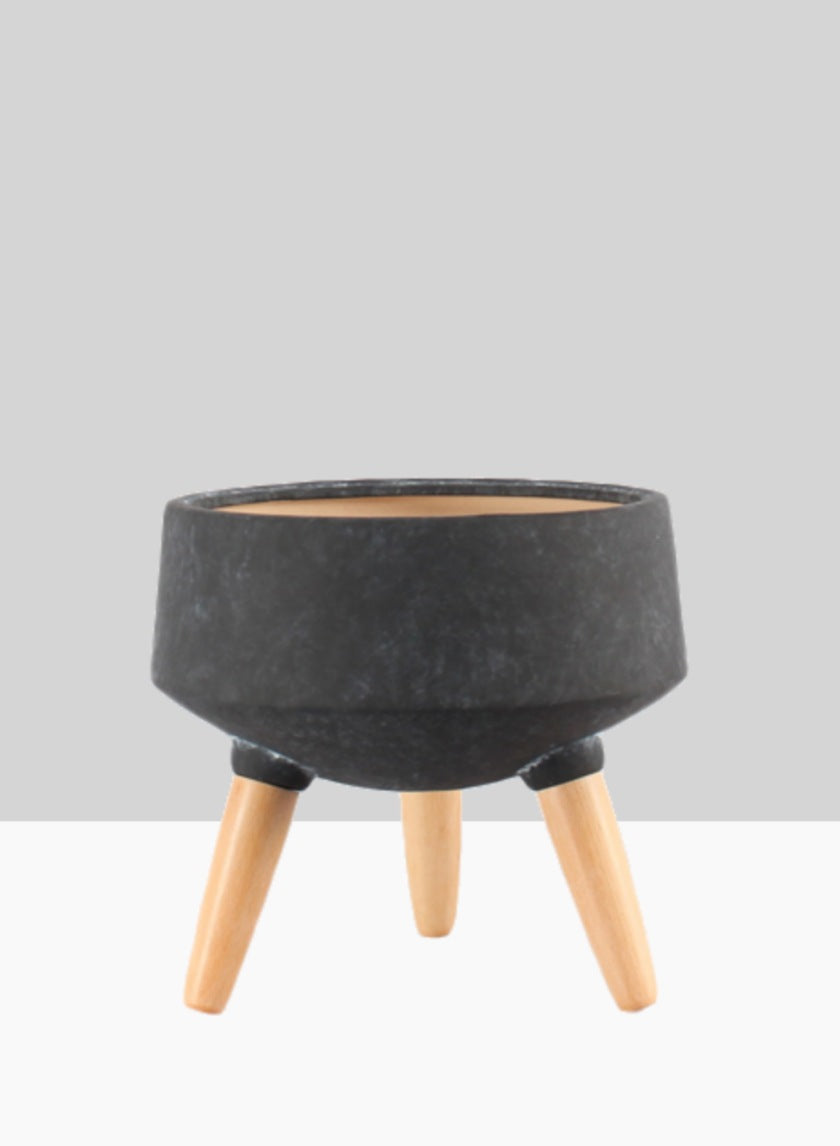 black plant pot with legs 10.25in Tall Breakers Black Ceramic Planter With Beech Wood Legs – Jamali Garden
