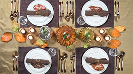 A THANKSGIVING TABLE SET WITH FALL COLORS